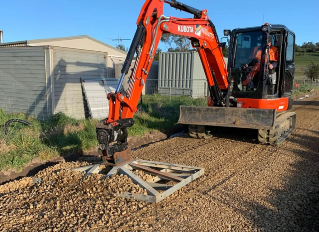 Excavator for driveway construction