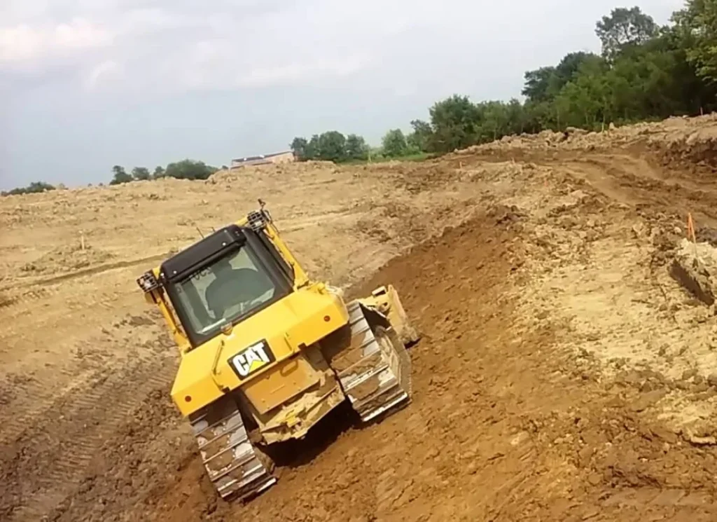 Bulldozer pushing dirt